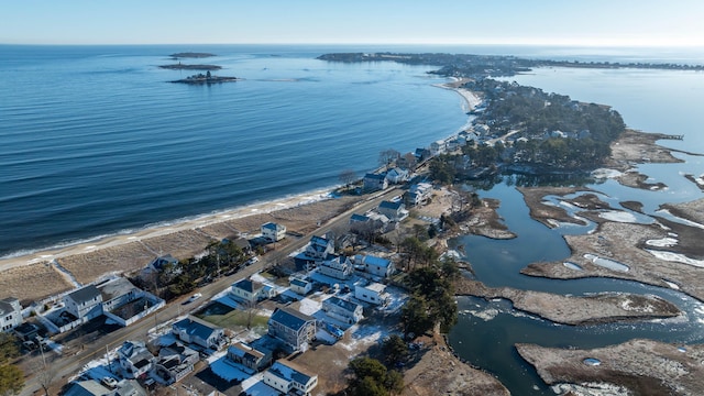 aerial view featuring a water view and a beach view