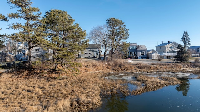 exterior space with a water view