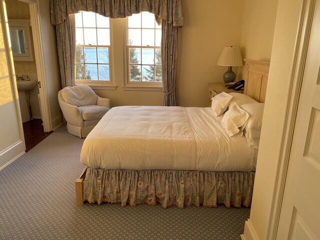 399 Hermits Point Rd, Islesboro, ME 04848 - bedroom with carpet flooring