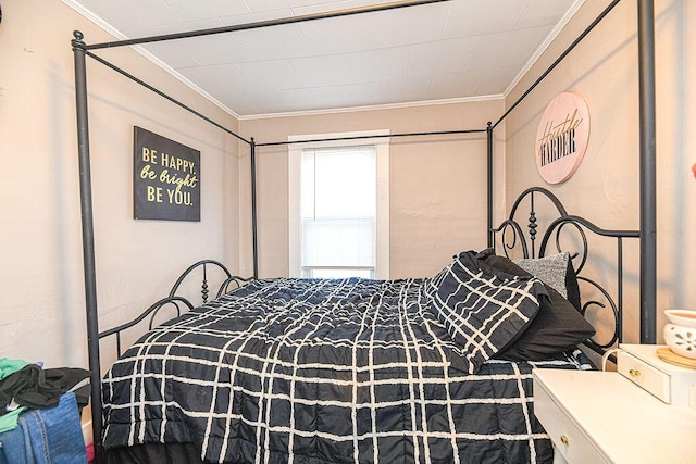 bedroom featuring crown molding