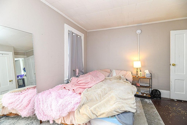 carpeted bedroom featuring ornamental molding