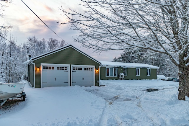 ranch-style home with a garage