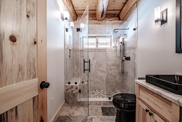 bathroom with vanity, wooden ceiling, toilet, walk in shower, and beamed ceiling