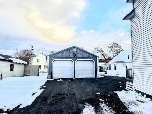 view of snow covered garage