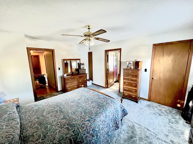 carpeted bedroom featuring ceiling fan