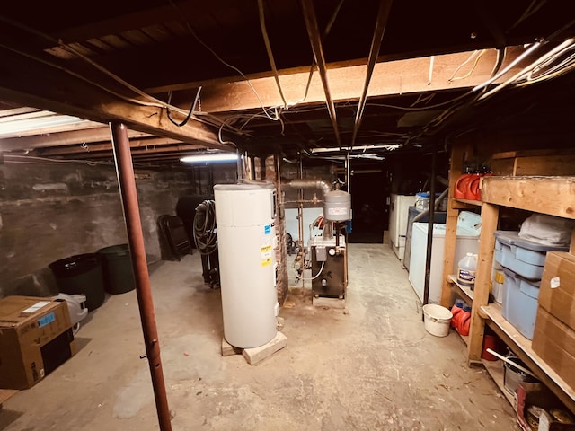 basement with washing machine and dryer and gas water heater