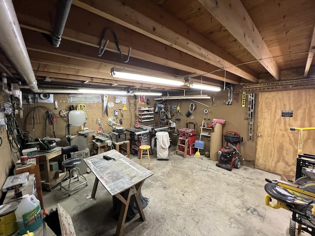 garage with a workshop area