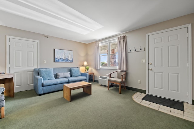 living room with an AC wall unit and carpet floors