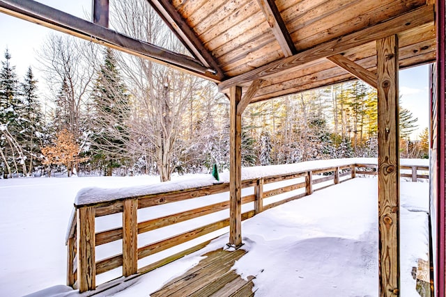 view of snow covered deck