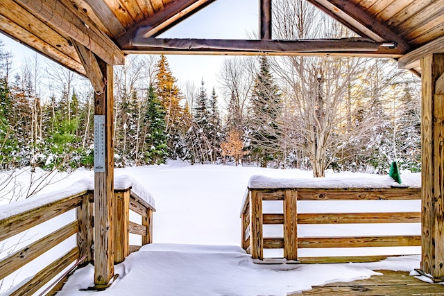 view of snow covered deck