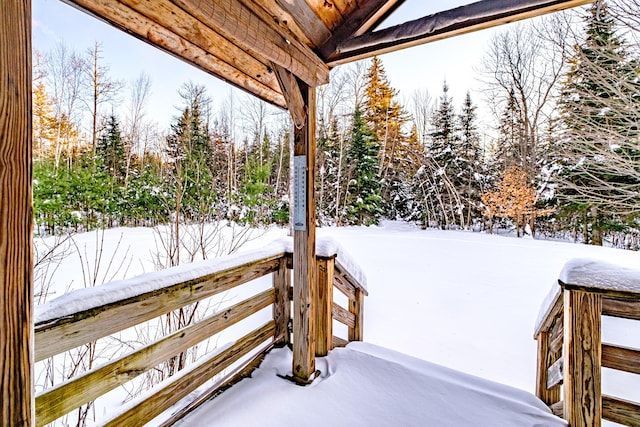 view of snow covered deck