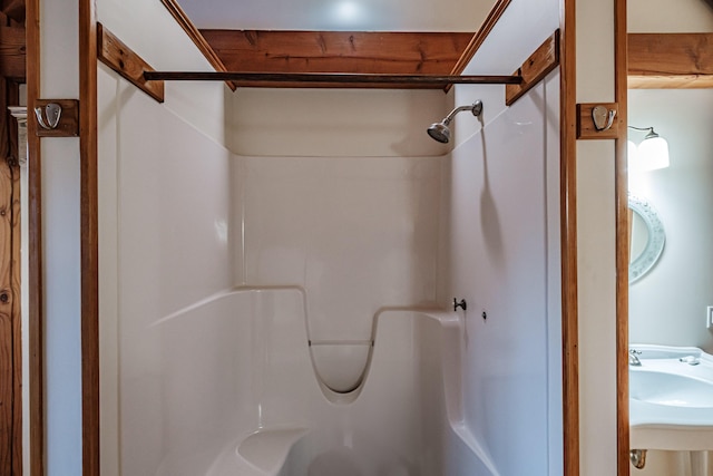 bathroom featuring sink and walk in shower