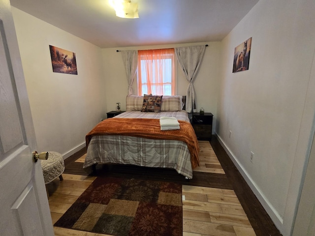 bedroom featuring hardwood / wood-style flooring