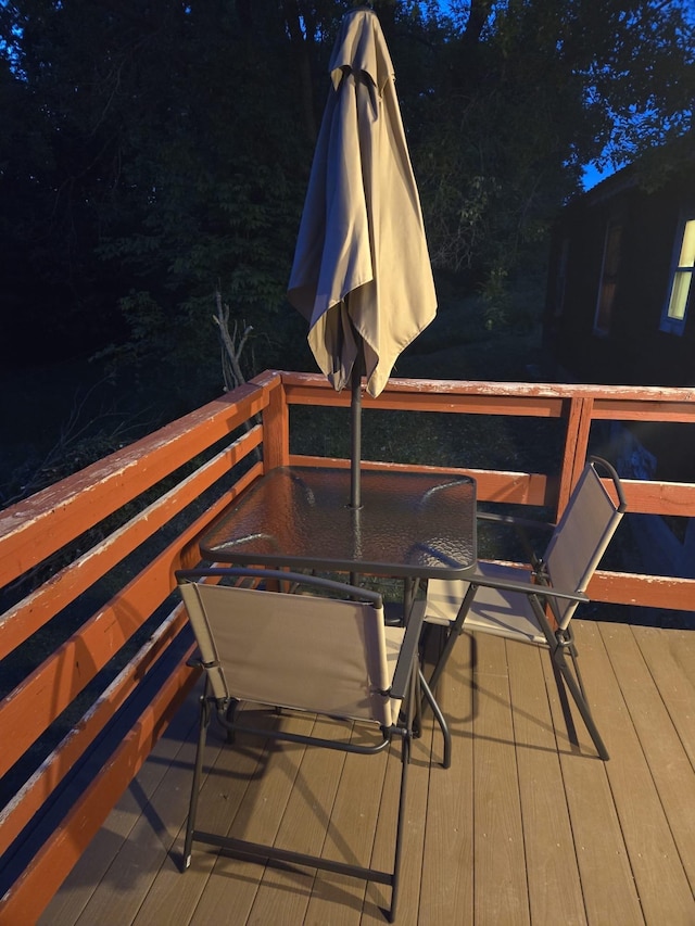 view of deck at twilight