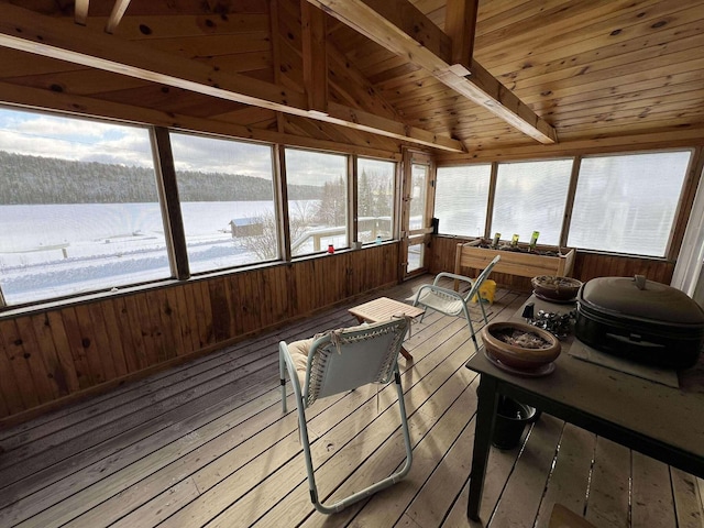 sunroom with vaulted ceiling with beams and wooden ceiling