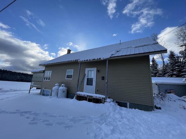 view of snow covered property