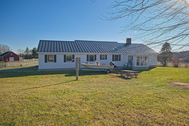 19 Branch Brook Rd, Thomaston, ME 04861 - back of property featuring a chimney and a metal roof