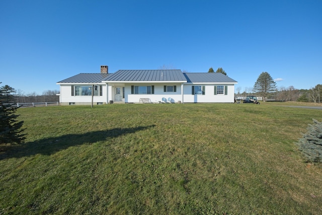 19 Branch Brook Rd, Thomaston, ME 04861 - view of front of house featuring a chimney and a metal roof