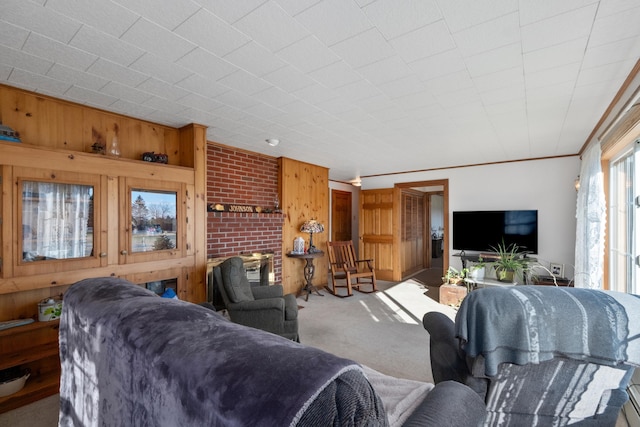 19 Branch Brook Rd, Thomaston, ME 04861 - carpeted living area featuring ornamental molding and wood walls