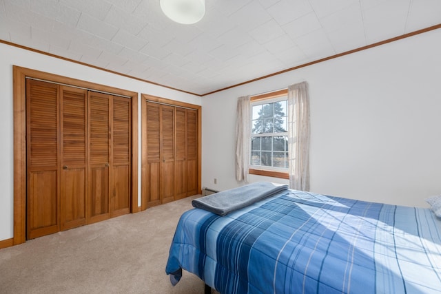 19 Branch Brook Rd, Thomaston, ME 04861 - carpeted bedroom with crown molding, two closets, and baseboard heating