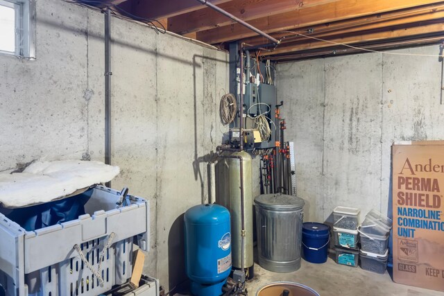 19 Branch Brook Rd, Thomaston, ME 04861 - unfinished basement with a water pressure tank and a water softener system
