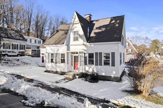 view of new england style home