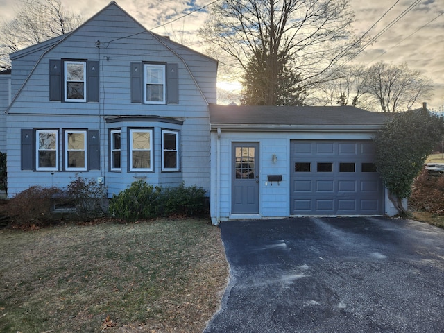 front facade with a garage