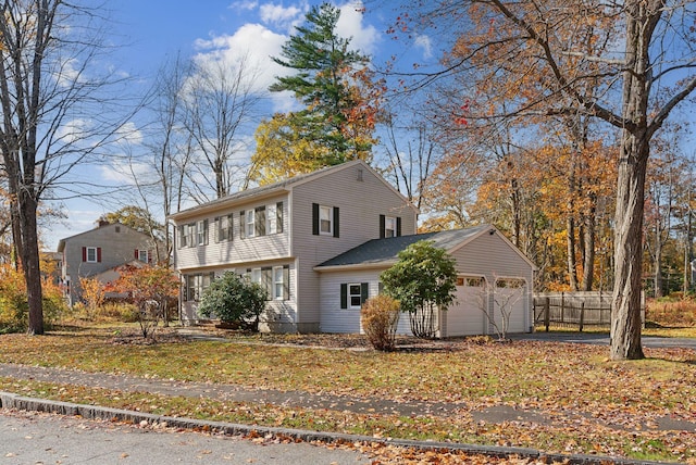 view of side of property with a garage