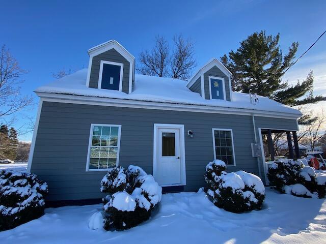 view of new england style home