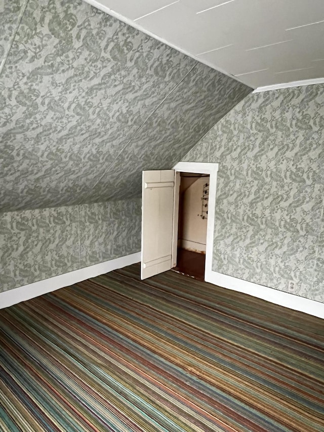 90 Canada Rd, Moscow, ME 04920 - bonus room featuring dark carpet and lofted ceiling