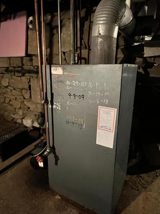 90 Canada Rd, Moscow, ME 04920 - utility room featuring a heating unit
