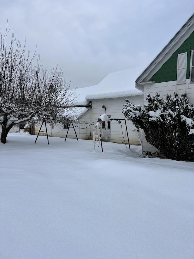 view of yard covered in snow