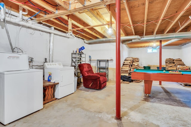 basement featuring pool table and washing machine and clothes dryer