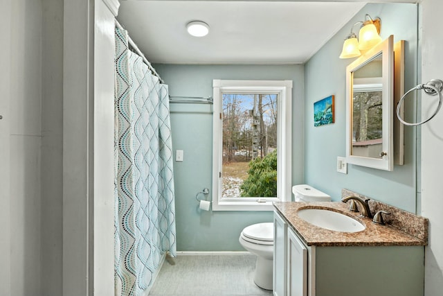 bathroom with tile patterned flooring, vanity, toilet, and a shower with shower curtain