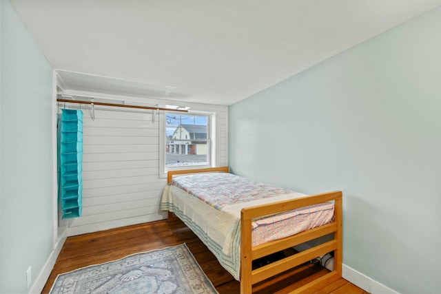 bedroom featuring wood-type flooring