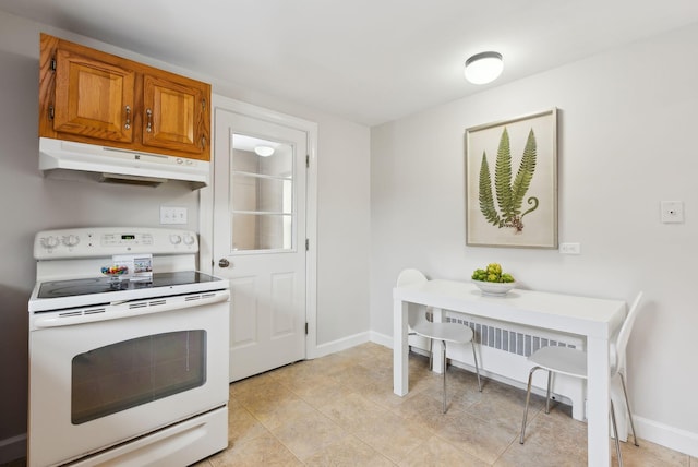 kitchen featuring radiator, light tile patterned flooring, and white range with electric stovetop