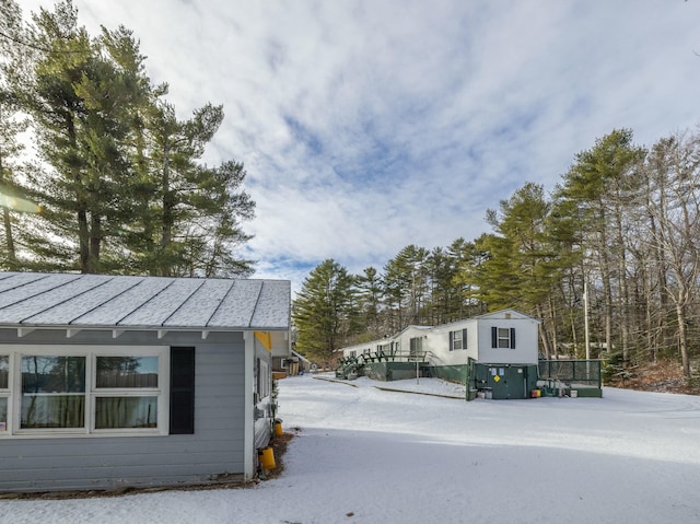 view of snow covered property