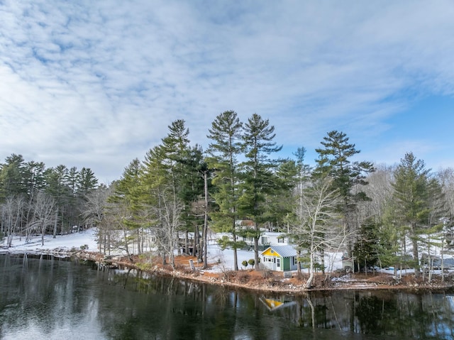 surrounding community with a water view