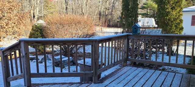 view of snow covered deck