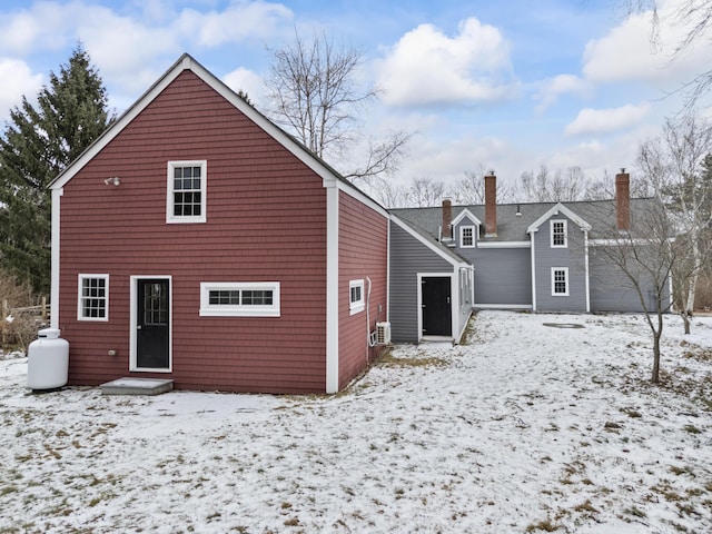 view of snow covered house