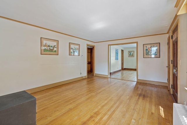 52 Chenery St, Portland, ME 04103 - spare room featuring light wood-type flooring and ornamental molding