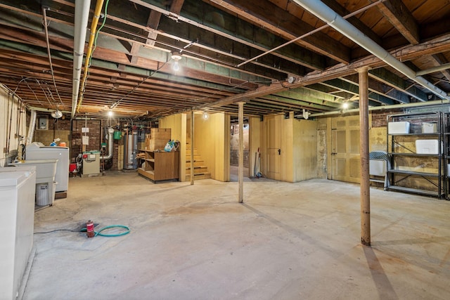 52 Chenery St, Portland, ME 04103 - unfinished below grade area with a heating unit and washer / clothes dryer