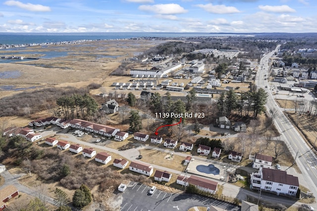 drone / aerial view featuring a water view