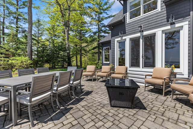 18 Sheehans Island Rd, Raymond, ME 04071 - view of patio / terrace with outdoor dining space and an outdoor living space