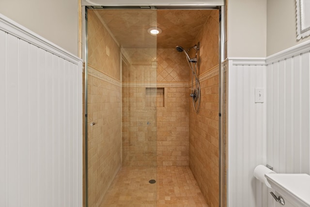 18 Sheehans Island Rd, Raymond, ME 04071 - full bath featuring a stall shower, toilet, and wainscoting