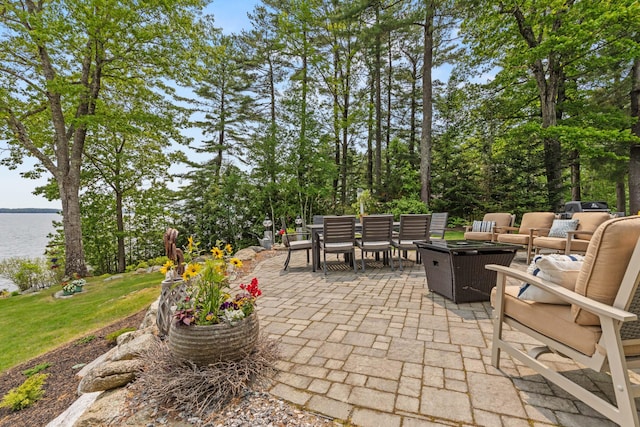 18 Sheehans Island Rd, Raymond, ME 04071 - view of patio / terrace with outdoor lounge area, outdoor dining area, and a water view