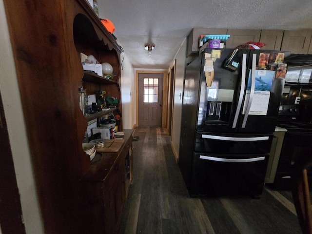 kitchen featuring a textured ceiling, dark hardwood / wood-style floors, and black refrigerator with ice dispenser