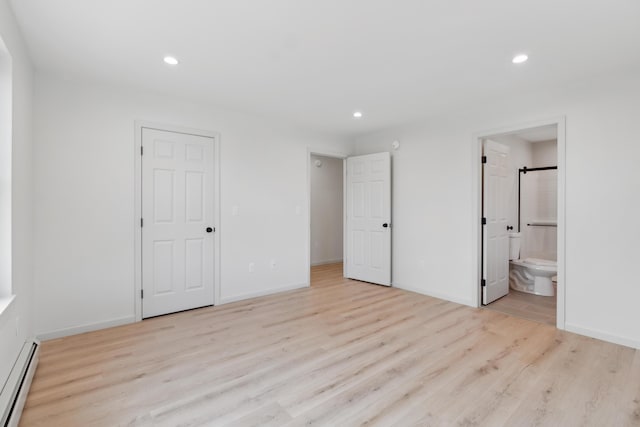 17 Ward Rd, Sebago, ME 04029 - unfurnished bedroom with wood finished floors, a baseboard heating unit, ensuite bath, and recessed lighting