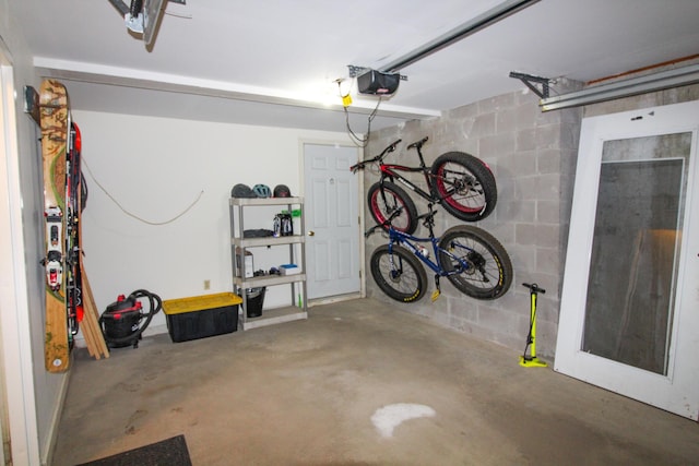 135 Vernon St Unit 4E, Bethel, ME 04217 - garage with a garage door opener and concrete block wall