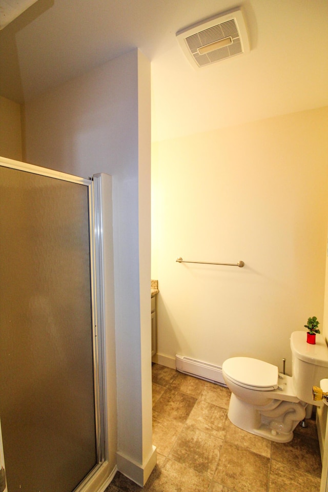 bathroom with vanity, a baseboard radiator, toilet, and a shower with door